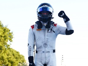 Race winner Juri Vips of Estonia celebrates in parc ferme during the Round 13:Monza Sprint race of the Formula 2 Championship in 2022.