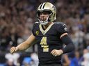 Derek Carr of the New Orleans Saints celebrates during the fourth quarter against the Tennessee Titans.