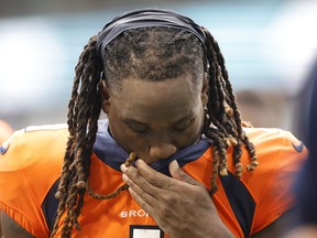 Tremon Smith of the Denver Broncos reacts after his team's 70-20 loss against the Miami Dolphins.
