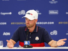 Wyndham Clark of Team United States speaks in a press conference following a practice round prior to the 2023 Ryder Cup.