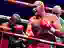 Britain's Tyson Fury fights against Britain's Derek Chisora during their WBC heavyweight title boxing match on December 3, 2022.