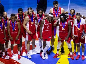 Canadian team celebrates after winning the FIBA Basketball World Cup third-place game.