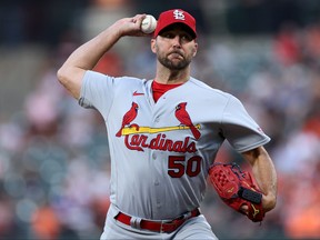 Adam Wainwright of the St. Louis Cardinals pitches against the Baltimore Orioles.