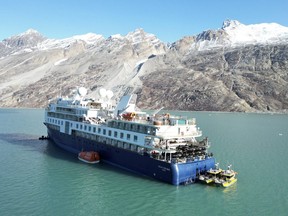 A view of the Ocean Explorer, a Bahamas-flagged cruise ship with 206 passengers and crew, which has run aground in northwestern Greenland, on Tuesday, Sept. 12, 2023.
