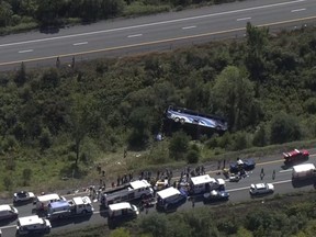 Emergency responders work the scene of a bus crash, in Wawayanda, N.Y., Thursday, Sept. 21, 2023.