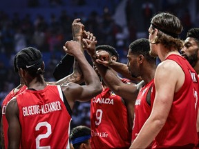 Canada's players react during the FIBA Basketball World Cup group L match between Spain and Canada at Indonesia Arena in Jakarta on Sept. 3, 2023.