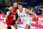 Serbia's Bogdan Bogdanovic (R) blows past Canada's Dillon Brooks during the FIBA Basketball World Cup semi-final match between Serbia and Canada in Manila on September 8, 2023. (Photo by SHERWIN VARDELEON/AFP via Getty Images)