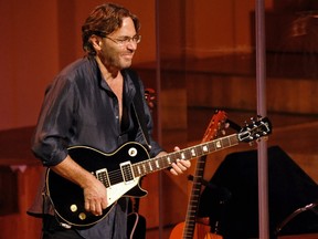 In this July 13, 2008 file photo, guitarist Al Di Meola performs on stage during the XII Jazz Festival in Valencia's Palau de la Musica.