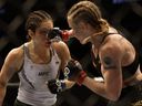 In this March 4, 2023 file photo, Alexa Grasso of Mexico fights Valentina Shevchenko of Kyrgyzstan in the UFC flyweight championship fight during the UFC 285 event at T-Mobile Arena in Las Vegas, Nevada. 
