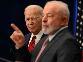 U.S. President Joe Biden (left) listens to Brazilian President Luiz Inacio Lula da Silva as they launch the Partnership for Workers' Rights, on the sidelines of the 78th United Nations General Assembly, in New York City, Wednesday, Sept. 20, 2023.