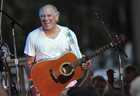 Jimmy Buffett performs at his sister’s restaurant in Gulf Shores, Ala., on June 30, 2010. 