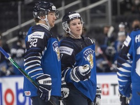 Finland Topi Niemelä (right) was chosen by the Maple Leafs in the third round of the 2020 NHL draft. The defenceman says he has been working on improving his shot.