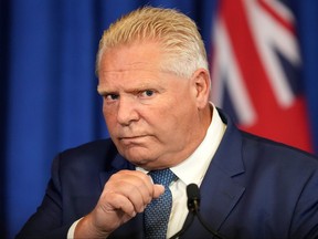 Ontario Premier Doug Ford speaks to journalists at Queen's Park in Toronto on Tuesday, September 5, 2023.