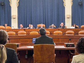 Michael Chong (centre) appears before the Congressional-Executive Commission on China in Washington, D.C. on Tuesday, Sept.12, 2023. The Conservative MP at the centre of Canada's foreign interference saga is urging Capitol Hill lawmakers to work with their northern neighbour to battle Beijing.