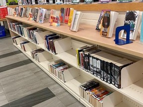 A handout photo shows empty shelves in the library at Erindale Secondary School in Mississauga. Ontario's education minister says he has asked an Ontario public school board to immediately remove the new and seemingly arbitrary practice of removing books published before 2008 from school libraries. THE CANADIAN PRESS/HO-Reina Takata **MANDATORY CREDIT**