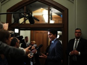Prime Minister Justin Trudeau speaks to the media en route to a cabinet meeting on Parliament Hill in Ottawa on Tuesday, September 19, 2023.