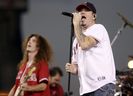 Singer Steve Harwell, of Smash Mouth, performs with the band during a rally celebrating the Los Angeles Angels' American League West Division Championship in Anaheim, Calif. on Monday, Sept. 29, 2008.  