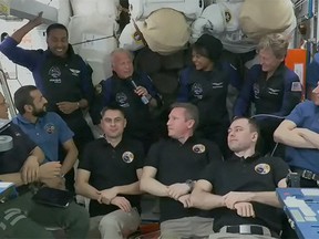 In this handout image released by NASA on May 22, 2023, four Axiom Mission 2 astronauts Peggy Whitson, John Shoffner, Ali Alqarni, and Rayyanah Barnawi gather for a crew greeting ceremony aboard the International Space Station with the seven members of Expedition 69, Frank Rubio, Woody Hoburg, and Stephen Bowen, UAE astronaut Sultan Alneyadi, and Roscosmos cosmonauts Dmitri Petelin, Andrey Fedyaev, and Sergey Prokopyev.