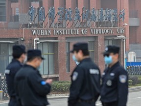 Security personnel guard the Wuhan Institute of Virology in Wuhan