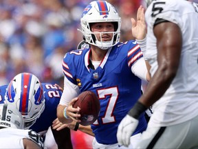 Josh Allen of the Buffalo Bills signals for a first down during the third quarter against the Las Vegas Raiders at Highmark Stadium on Sept. 17, 2023 in Orchard Park, N.Y.