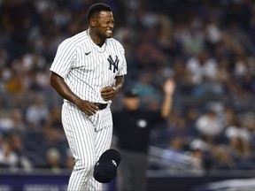 Pitcher Luis Severino of the New York Yankees winces in pain after giving up a single to Brice Turang of the Milwaukee Brewers during the fifth inning at Yankee Stadium on Sept. 8, 2023 in New York City.