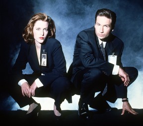 Actors Gillian Anderson, let, and David Duchovny from the TV series The X Files