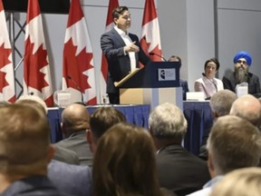 Conservative Leader Pierre Poilievre speaks to his caucus as he meets them prior to the Conservative convention, in Quebec City