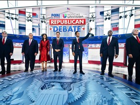From Left: North Dakota Governor Doug Burgum, former Governor of New Jersey Chris Christie, former Governor from South Carolina and UN ambassador Nikki Haley, Florida Governor Ron DeSantis, entrepreneur Vivek Ramaswamy, U.S. Senator from South Carolina Tim Scott and former U.S. vice-president Mike Pence attend the second Republican presidential primary debate at the Ronald Reagan Presidential Library in Simi Valley, Calif., on Sept. 27, 2023.