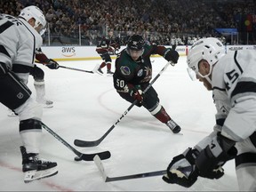 Sean Durzi of the Arizona Coyotes skates after the puck during the NHL Global Series match between Arizona Coyotes and Los Angeles Kings