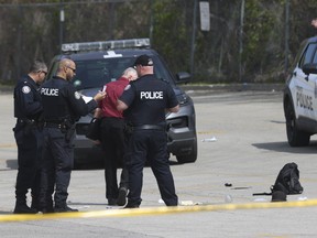 SIU investigate a police-involved shooting on May 10 behind Shoppers World plaza.