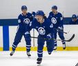 Toronto Maple Leafs  Tyler Bertuzzi (front), Mitch Marner  (left), and Auston Matthews during training camp at the Ford Performance Centre in Etobicoke.