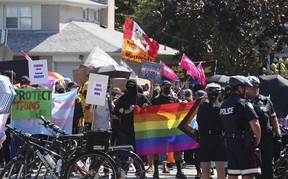 Tempers flared as a large group of pro-2SLGBTQ+ rights advocates staged a day-long rally outside Victoria Park C.I. in North York and were met by a group of counter-protesters on Friday, Sept. 22, 2023.