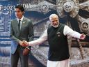 Prime Minister Justin Trudeau is officially welcomed to the G20 Summit by Indian Prime Minister Narendra Modi in New Delhi, India on Saturday, Sept. 9, 2023. THE CANADIAN PRESS/Sean Kilpatrick