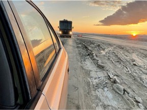 Vehicles line up to leave the site of the annual Burning Man