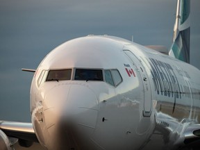 Though Canadian flights have long been dominated by Air Canada and WestJet, the emergence of newer carriers including Flair Airlines and Lynx Air has shaken up the sector, injecting fresh competition to a once-complacent market. A WestJet Airlines Boeing 737 Max aircraft taxis to a gate after arriving at Vancouver International Airport in Richmond, B.C., Thursday, Jan. 21, 2021.