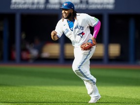 Toronto Blue Jays first baseman Vladimir Guerrero Jr. reacts after taking a catch to out Boston Red Sox Justin Turner, not shown, during eighth inning American League MLB baseball action in Toronto, Saturday, Sept. 16, 2023. Guerrero Jr. was held out of the starting lineup for a second straight day on Thursday as he rests a sore knee.THE CANADIAN PRESS/Chris Young