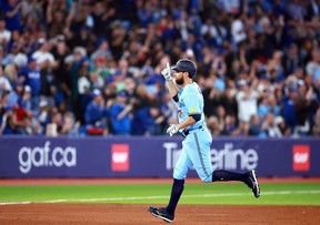 Brandon Belt of the Blue Jays celebrates after hitting a three-run home run in the sixth inning against the New York Yankees at Rogers Centre on Sept. 28, 2023 in Toronto. Vaughn Ridley/Getty Images