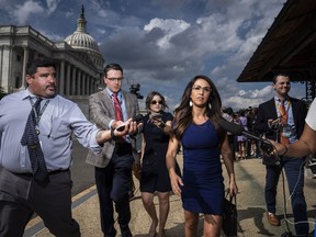 Rep. Lauren Boebert (R-Colo.) departs after speaking with members of the conservative House Freedom Caucus during a news conference on Capitol Hill on Tuesday. MUST CREDIT: Washington Post photo by Jabin Botsford