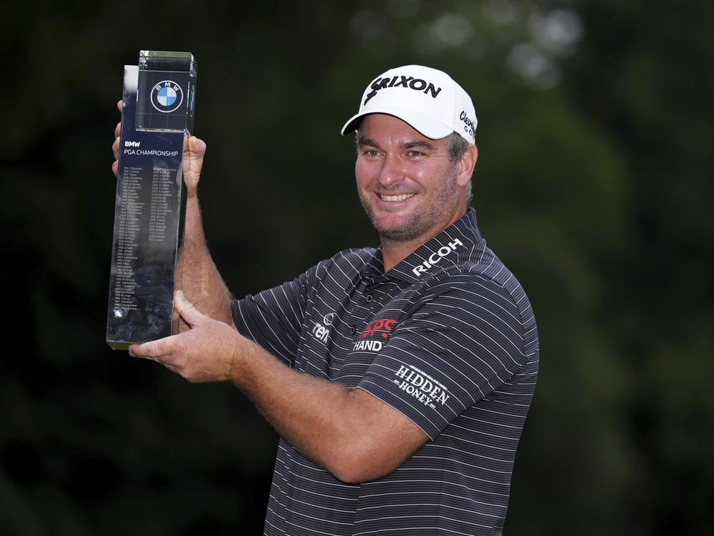Ryan Fox of New Zealand poses with the trophy after day four of the 2023 PGA Championship at Wentworth Golf Club in Virginia Water, Surrey, England, Sunday, Sept. 17, 2023.
