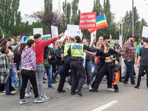 More than 1,000 protesters with anti-LGBTQ groups took part in the 1 Million March 4 Children near the office of the Alberta Teachers' Association on Wednesday, Sept. 20, 2023. They were greeted with a few hundred counter protesters and a couple minor skirmishes ensued.