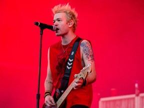 Deryck Whibley as Sum 41 play Download Festival - Photoshot - June 17