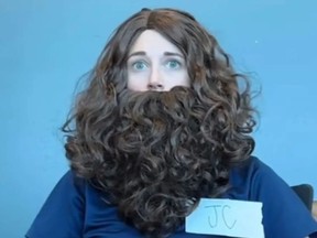 Woman in Jesus Christ wig and beard