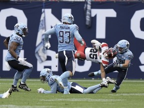 The Toronto Argonauts signed special-teams co-ordinator Mickey Donovan to a contract extension Tuesday. Montreal Alouettes running back Walter Fletcher (25) is flipped by Toronto Argonauts defensive back Royce Metchie (9) during second half CFL football action in Toronto, Saturday, Sept. 9, 2023.