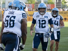 Toronto Argonauts quarterback Chad Kelly (12) celebrates with teammates during football game action against the Hamilton Tiger Cats in the annual Labour Day Classic in Hamilton, Ont., Monday, Sept. 4, 2023. Another week, another chance for Kelly and the Argonauts to clinch a season series with an East Division rival.