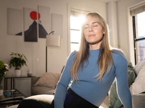 Megan relaxes at home four days after her egg retrieval.