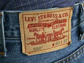 The familiar red tag from a pair of Levi's 550 jeans is seen Tuesday, Oct. 11, 2005, in San Francisco. Canada's corporate ethics watchdog has launched an investigation into allegations that Levi Strauss Canada is working with companies that use forced labour in China.