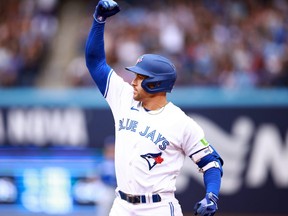 George Springer of the Toronto Blue Jays celebrates after hitting a RBI single in the fifth inning of the game against the Kansas City Royals at Rogers Centre on Sept. 9, 2023 in Toronto