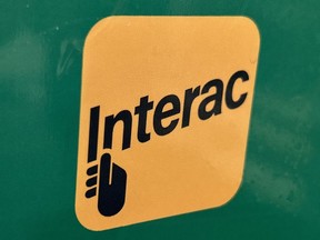 Interac Corp. is broadening the range of financial institutions that can participate in its e-transfer service. The Interac logo is shown in Toronto on Wednesday, Aug. 23, 2023.