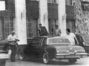 Credit: The U.S. Department of Justice Cutline: Murdered Canadian gangster Gerlando Sciascia, left, looks for the car keys while his accused killer, Joseph Massino, right, waits to get into a car in New York in 1981. In the middle, in the dark suit, is Vito Rizzuto, the alleged Mafia boss of Canada who U.S. authroties are trying to extradite to face a murder conspiracy charge.