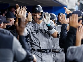 New York Yankees' Aaron Judge celebrates a two-run home run in the seventh inning against the Blue Jays at Rogers Centre on Sept. 27, 2023 in Toronto.